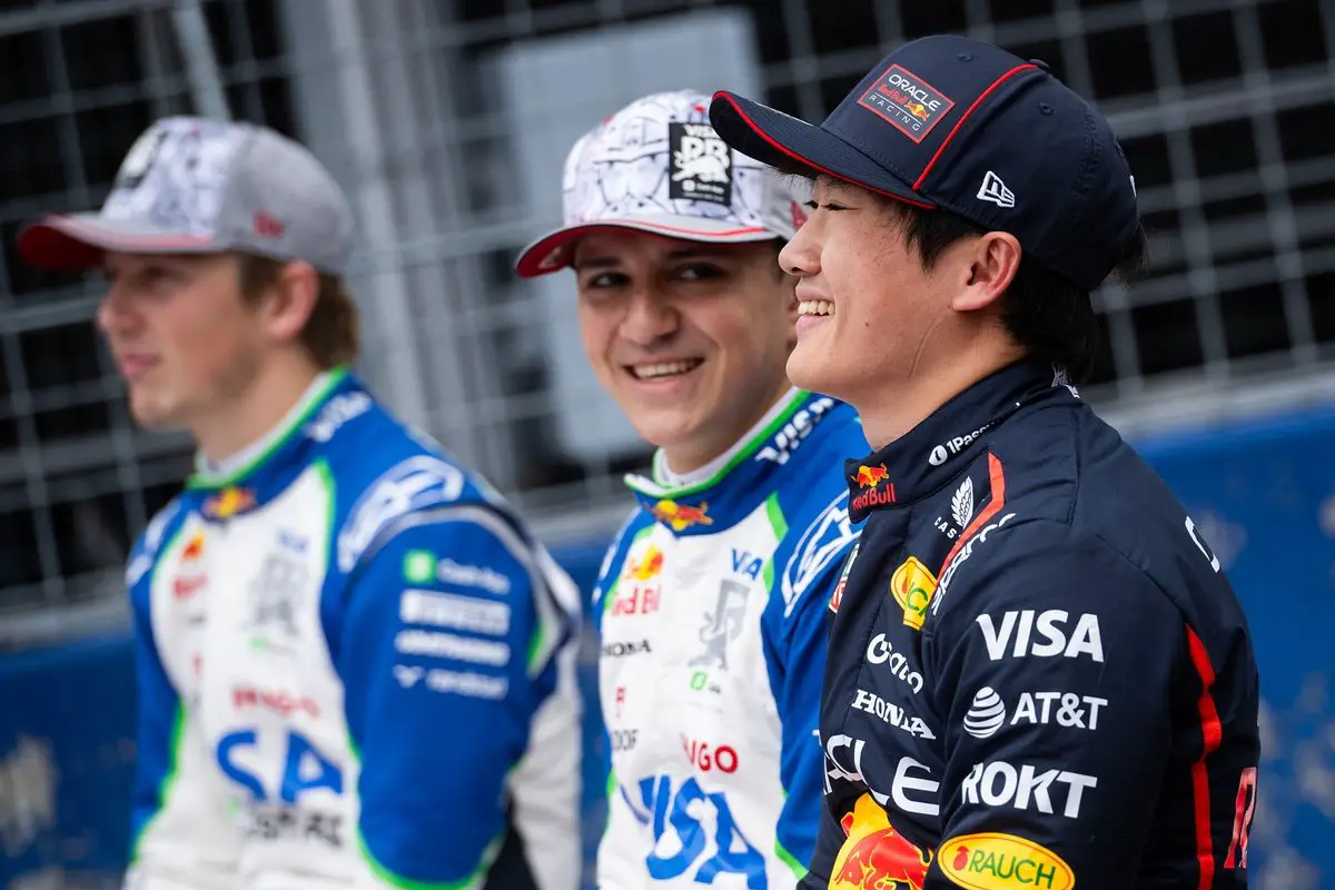 Yuki Tsunoda, Liam Lawson, and Isack Hadjar under Racing Bulls