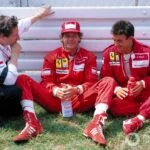 1994 German Grand Prix: Gerhard Berger, Jean Alesi, and Jean Todt in conversation (Ferrari team)
