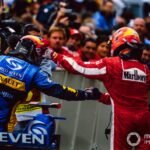Fernando Alonso, Renault, and Michael Schumacher, Ferrari exchange congratulations in Parc Ferme.