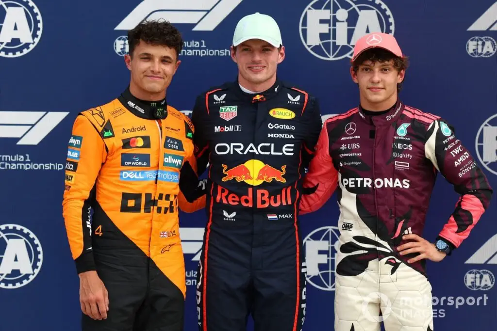 Lando Norris (McLaren) vs Max Verstappen (Red Bull Racing), with Andrea Kimi Antonelli racing for Mercedes