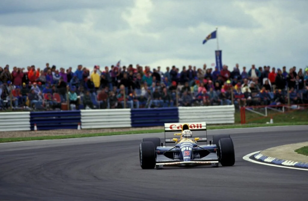Nigel Mansell with the Williams FW14B