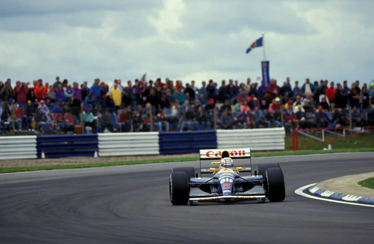 Nigel Mansell with the Williams FW14B